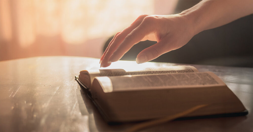 An open Bible representing quiet reflection and personal growth through scripture and faith-based reading.